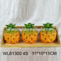 Cheap ceramic condiment set in pineapple shape with wooden bottom